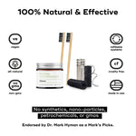 ORAL CARE ESSENTIALS KIT featuring Akamai Basics mineral toothpowder, bamboo toothbrushes, and eco-friendly packaging.