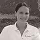 Portrait of a smiling woman outdoors, promoting a natural lifestyle and holistic personal care.