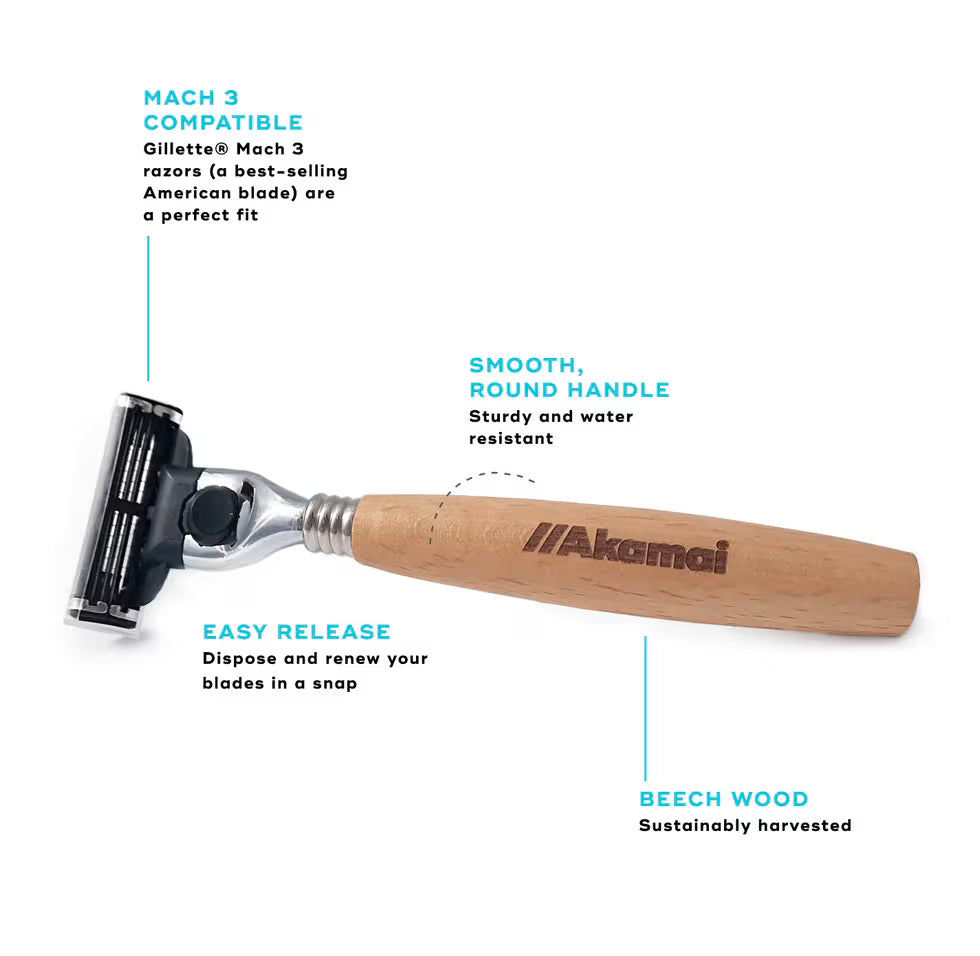 Akamai Basics razor with beech wood handle, compatible with Mach 3 blades for eco-conscious, minimalist grooming.