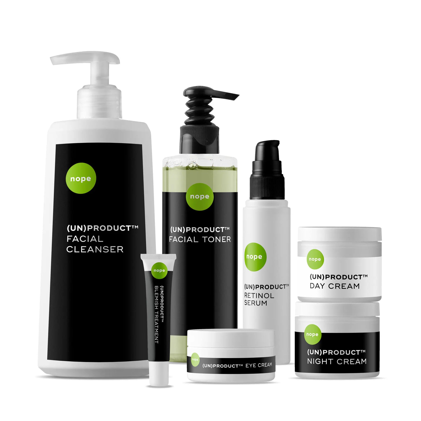 A set of (UN)PRODUCT skincare featuring facial cleanser, toner, serum, day cream, night cream, and eye cream in minimalist packaging.